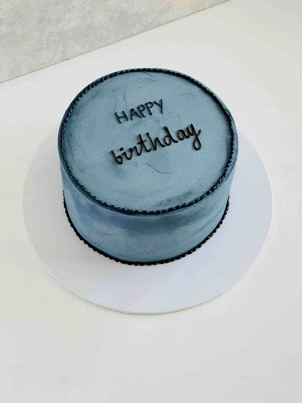 A Fig & Owl buttercream cake